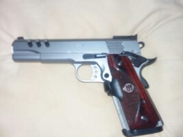 Smith & Weson Performance Center government model 45 ACP 1911 with Crimson Trace rosewood Mast...jpg