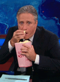 popcorn-jon-stewart-eating-popcorn-fast.gif