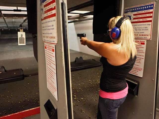 young-woman-at-gun-range-AP-640x480.jpg
